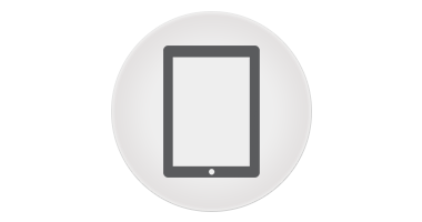 A simple graphic icon of a tablet within a circular shape, depicted in shades of gray with a minimalistic design, isolating the tablet as the central element.