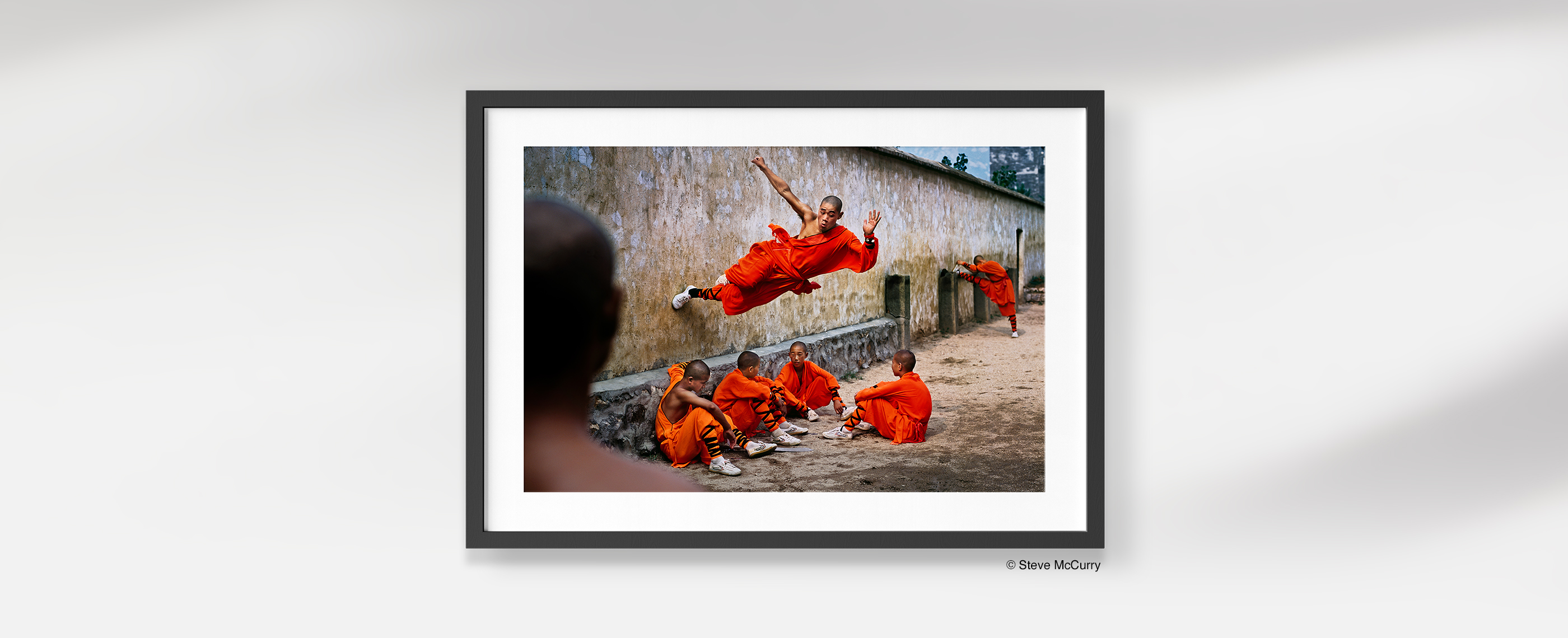 Framed art print, photo copyright Steve McCurry.