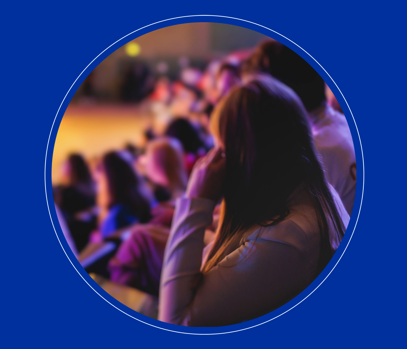 Woman sitting in a lecture hall