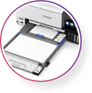 A paper tray loaded with several different types of printer paper