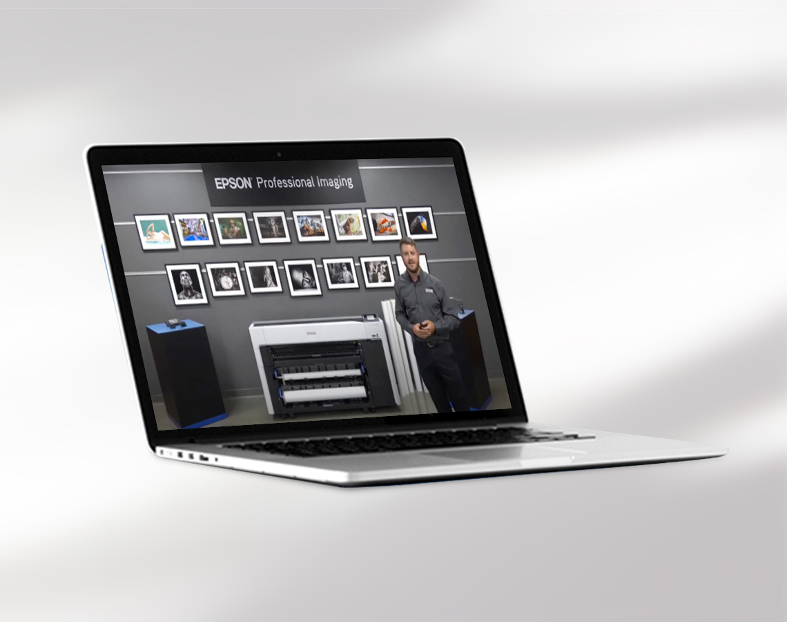 Epson webinar displayed on laptop.