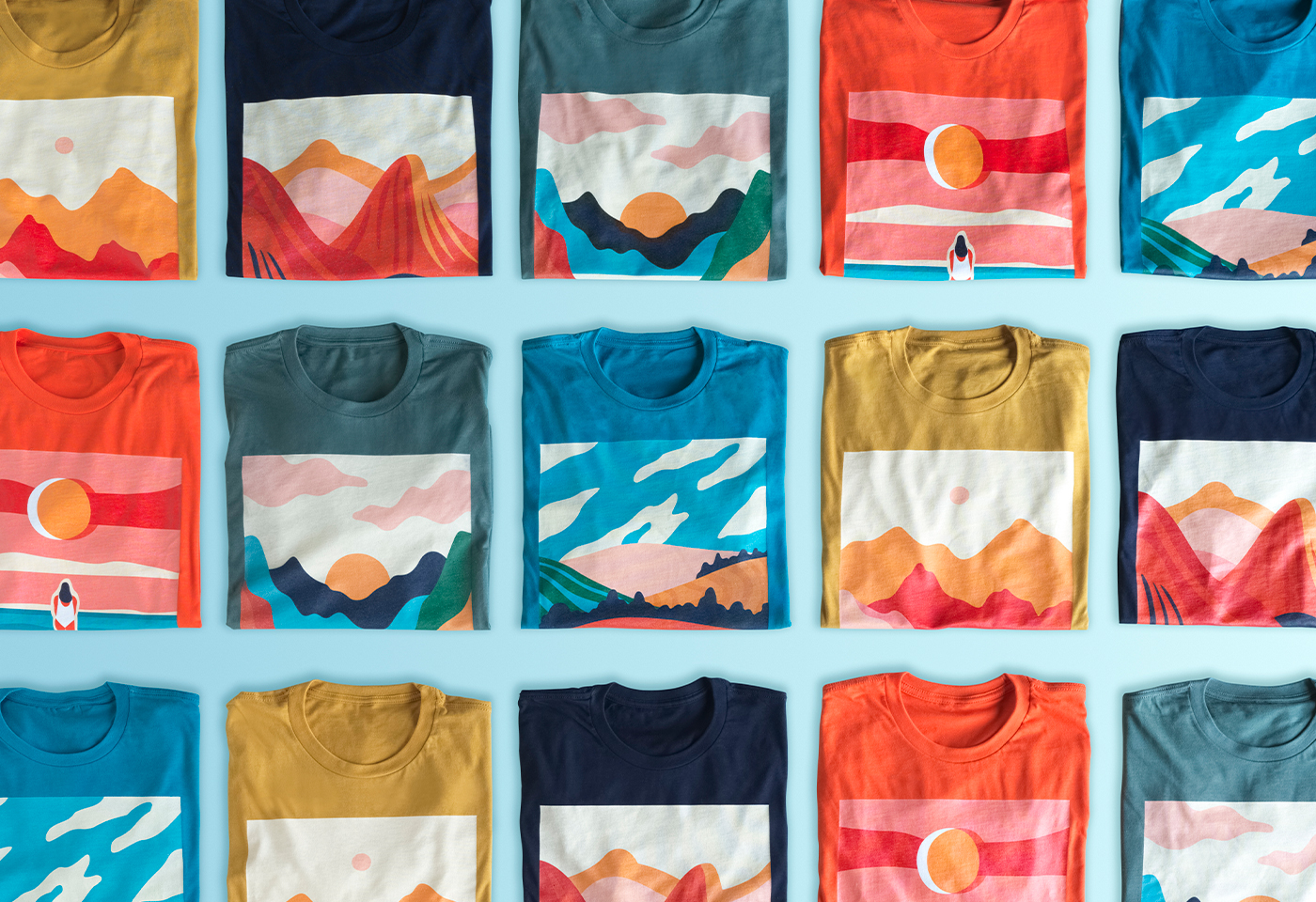 SureColor F1070 printer on table with stacks of t-shirts