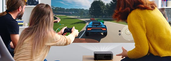 Family playing a game on a projected screen using the Lifestudio pop projector.