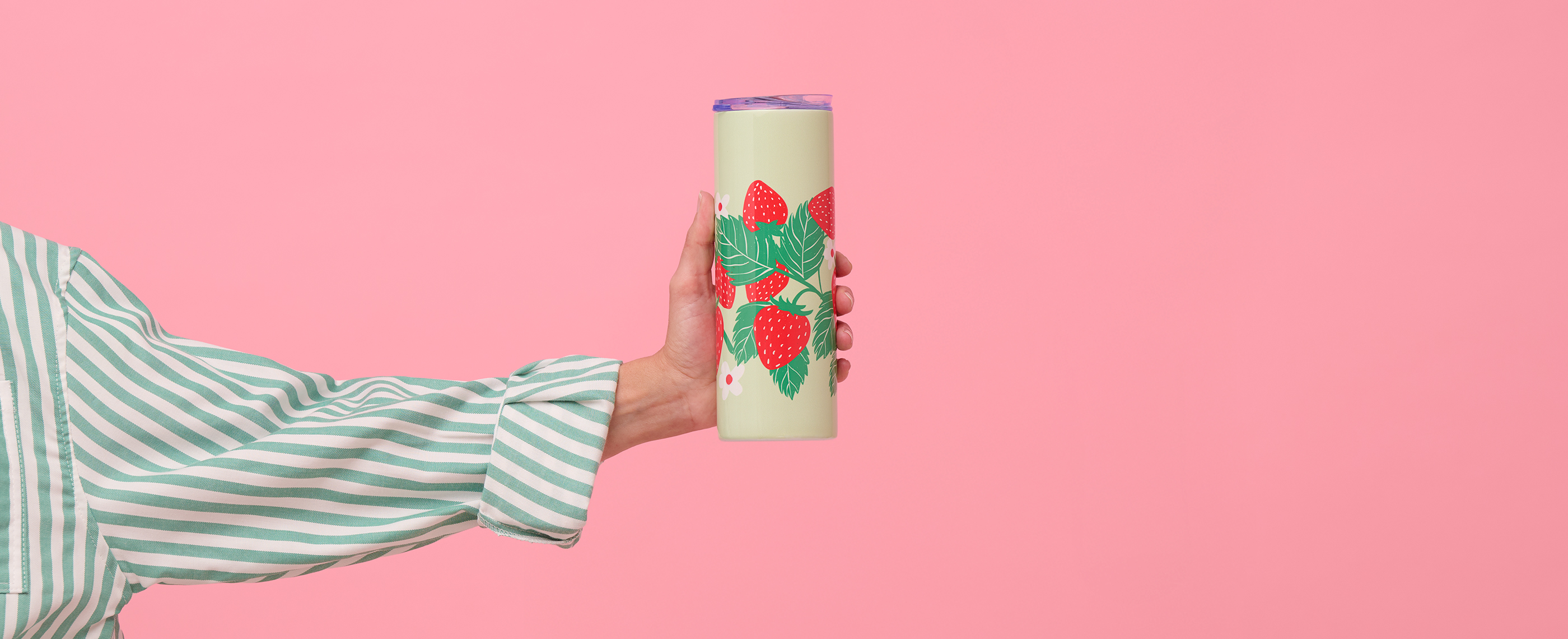 Tumbler with strawberry pattern. 