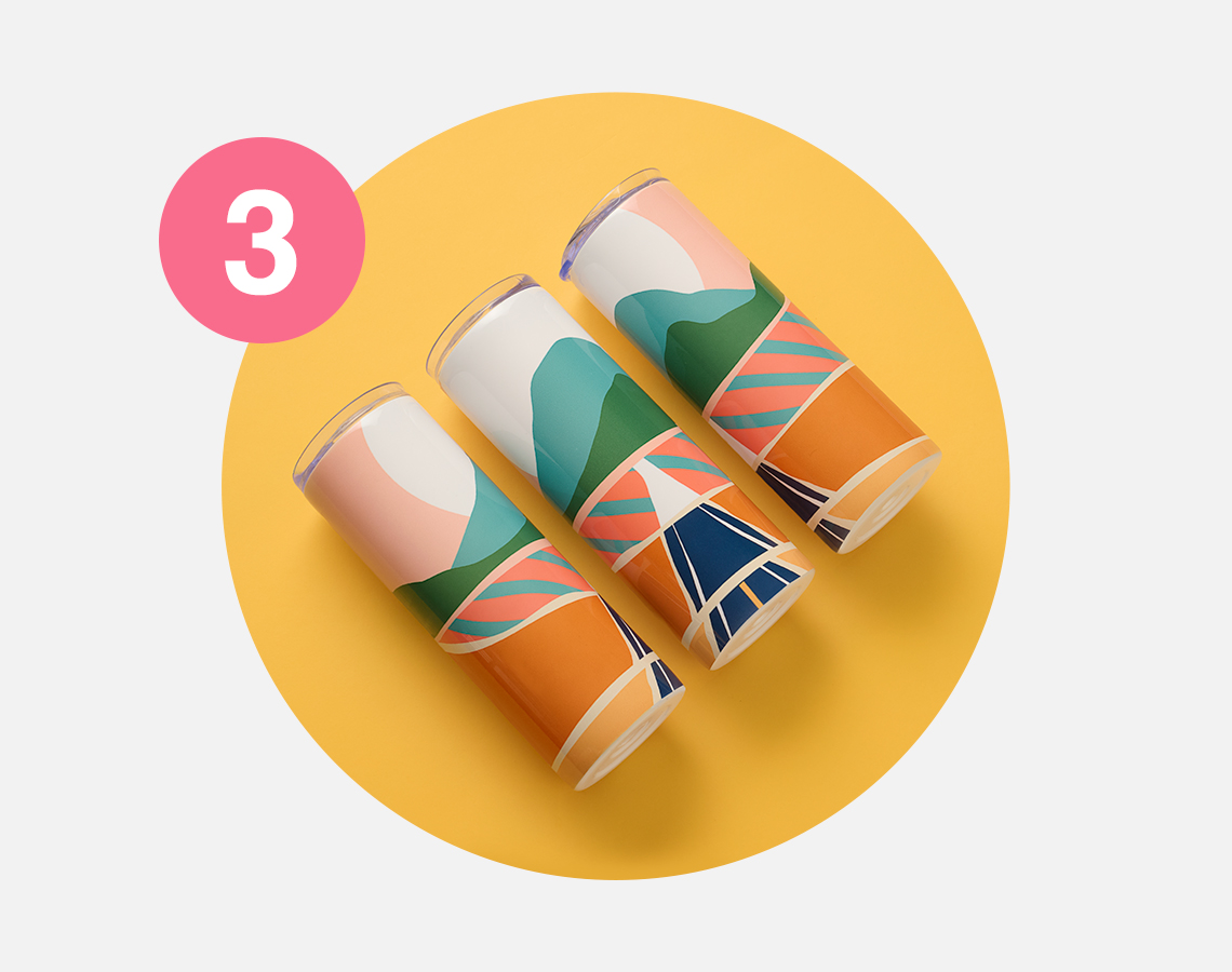 Three tumblers printed with sunset landscape illustration.