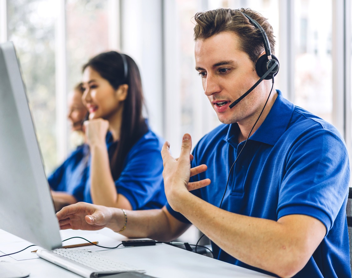 Support team talking on headsets