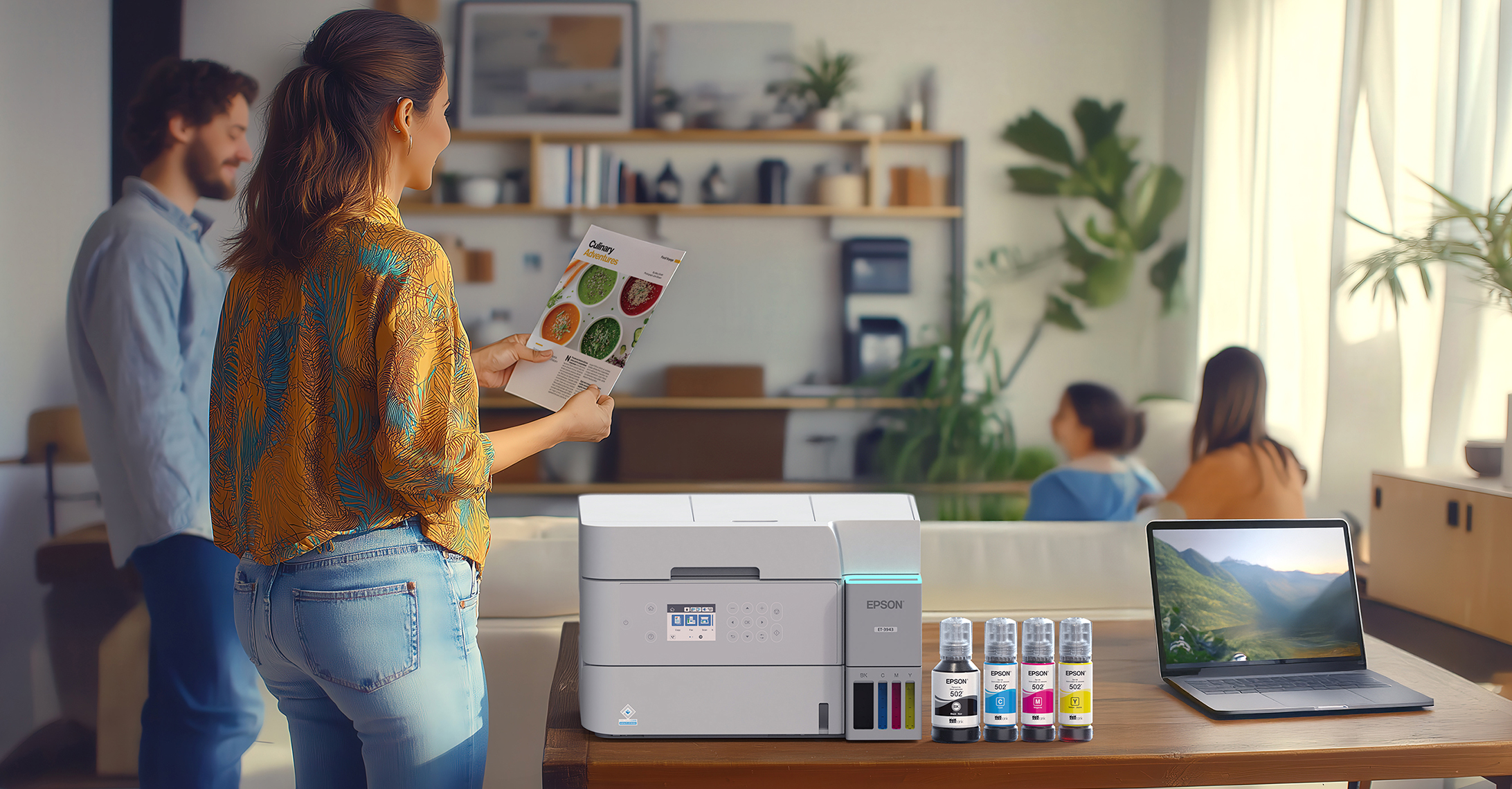 A mother stands next to an EcoTank printerink bottles and laptop in her living room looking at a printed recipe. Her husband and two children are in the background.