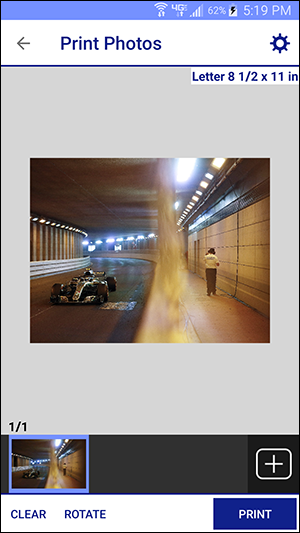 print photos window with formula one racecar and pedestrian in tunnel and thumbnail selected