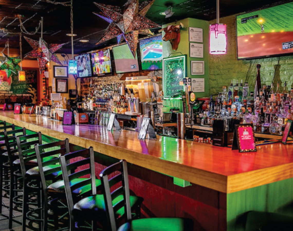A shot of a lively and colorful sports bar