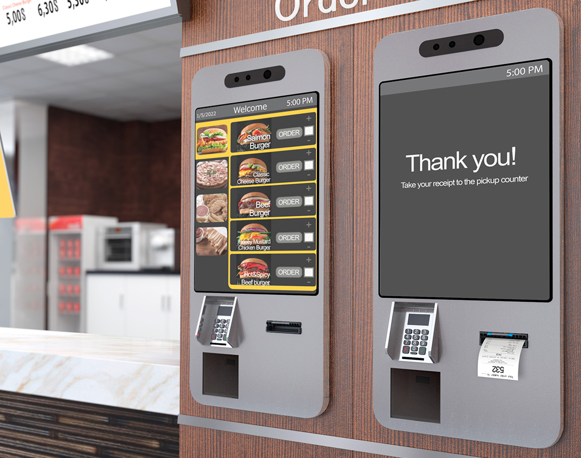 Kiosk receipt printers installed in a fast food restaurant.