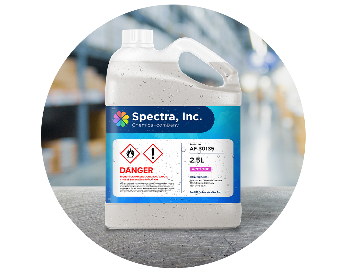 A bottle of acetone placed on a metal table in a chemical warehouse.