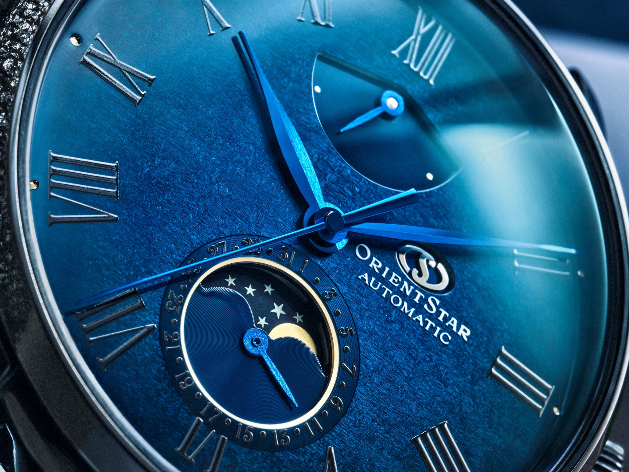 An extreme close up crop of the blue dial M45 F7 Mechanical Moon Phase watch